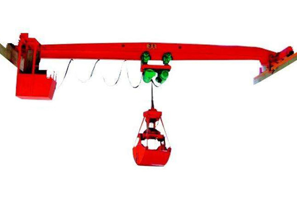 Macara montat pe șină cu graifer